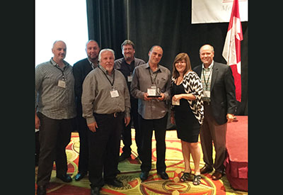 IMARK Canada reçoit dans le cadre de sa seconde assemblée annuelle à Toronto.Paul Wolf Lighting and Electrical et Standard Products, Inc en sortent gagnants